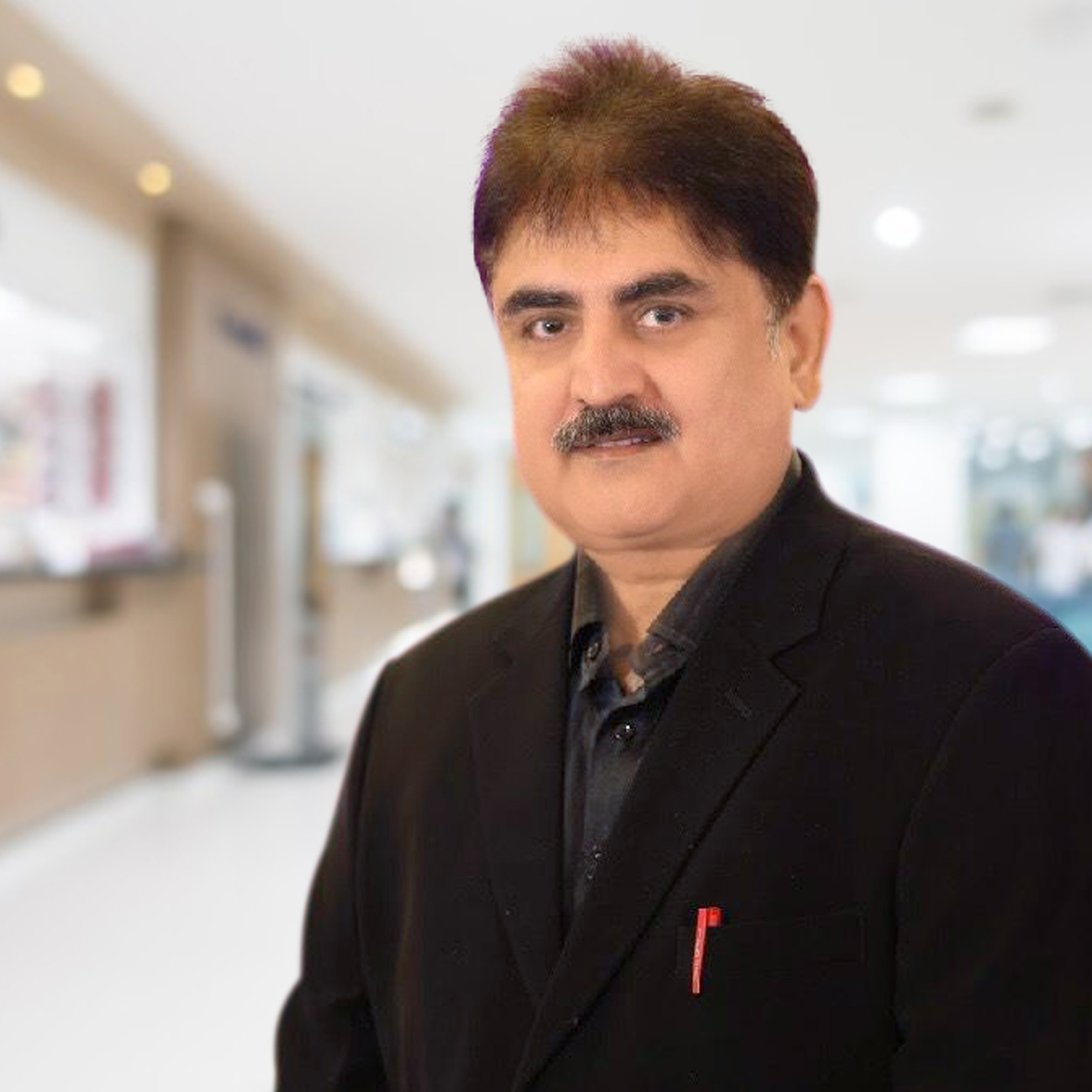 Dr. Suresh Arora